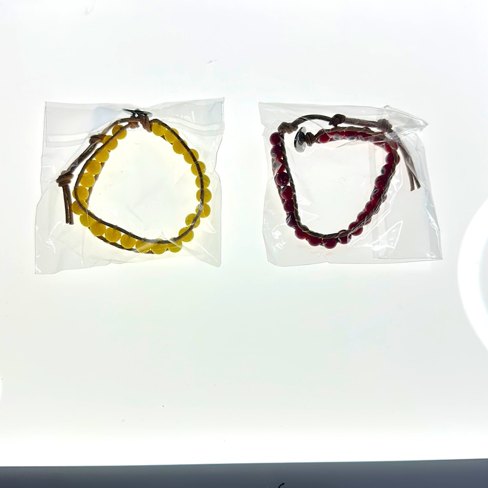 MATCHING RED AND YELLOW AQUA PURA BRACELET SET